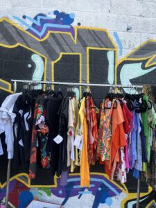 The colorful finds from Homegirl Thrift look amazing against the graffiti art in the RINO Arts District