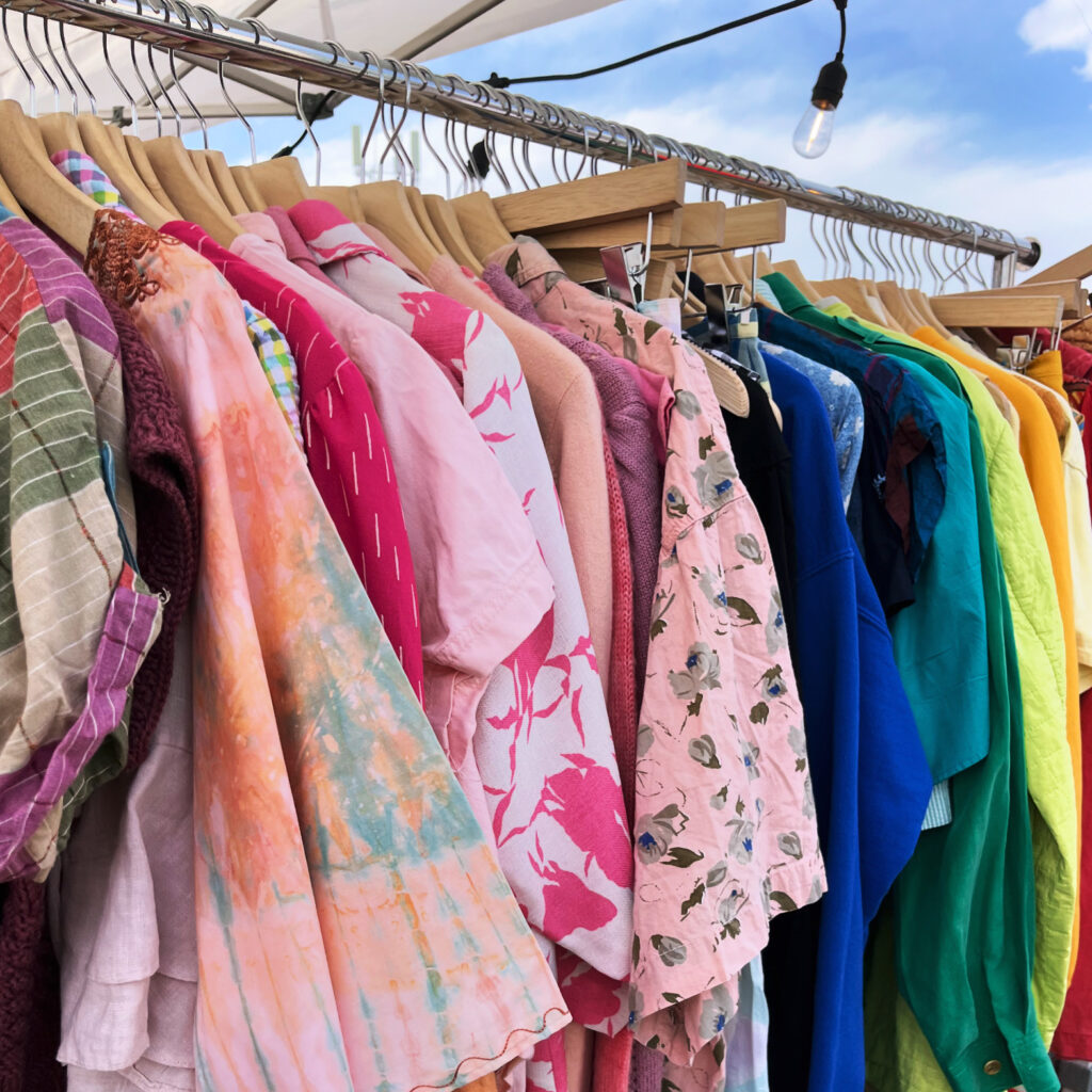 Colorful racks full of vintage clothing