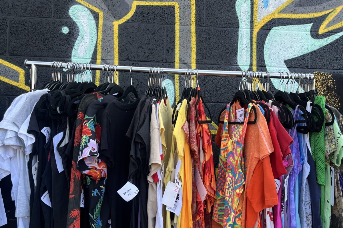 The colorful finds from Homegirl Thrift look amazing against the graffiti art in the RINO Arts District